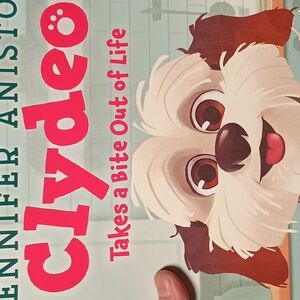 Clydeo takes a bite out of life By And Signed By Jennifer Aniston